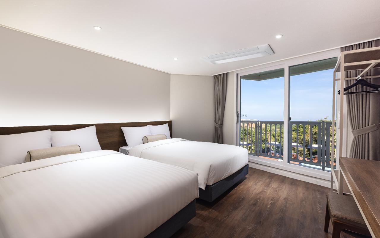 Kensington Resort Jeju Jungmun 真實海景家庭客房與兩張床